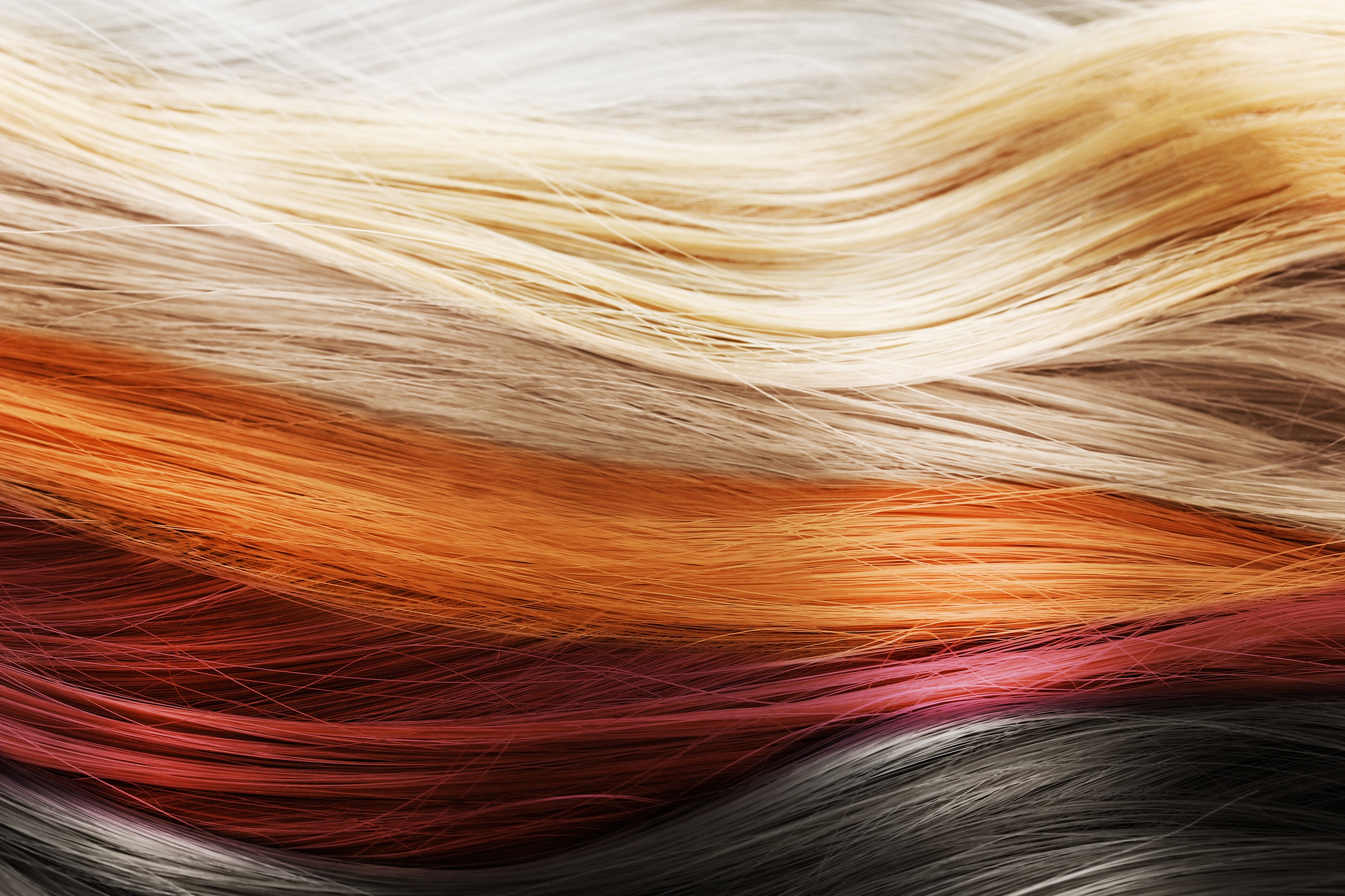 Colorful hair background. Hairstyles and care concept