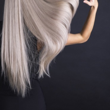 Long straight blonde hair in motion